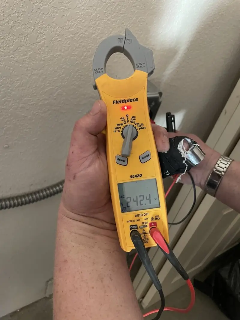 Voltage testing with clamp meter during Hot Tub / Pool Electrical Wiring in Alamo